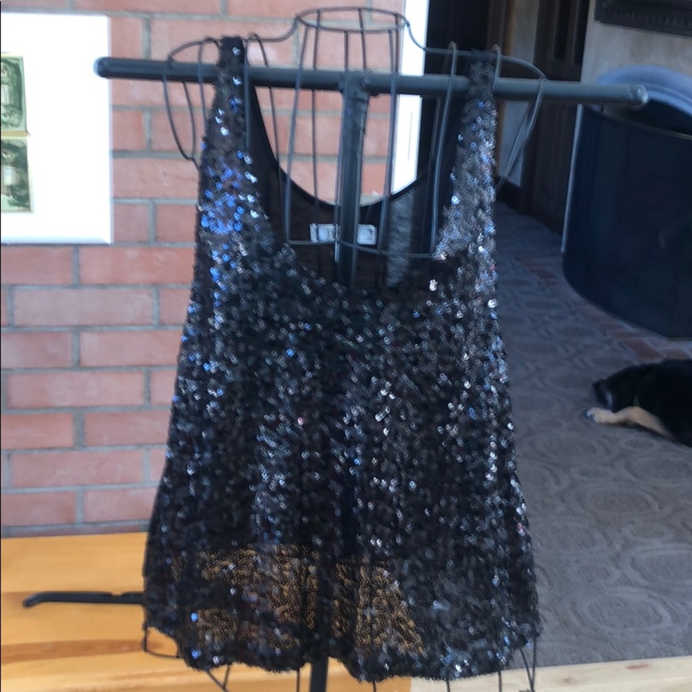Sequin tank still has tags. Sequin only front